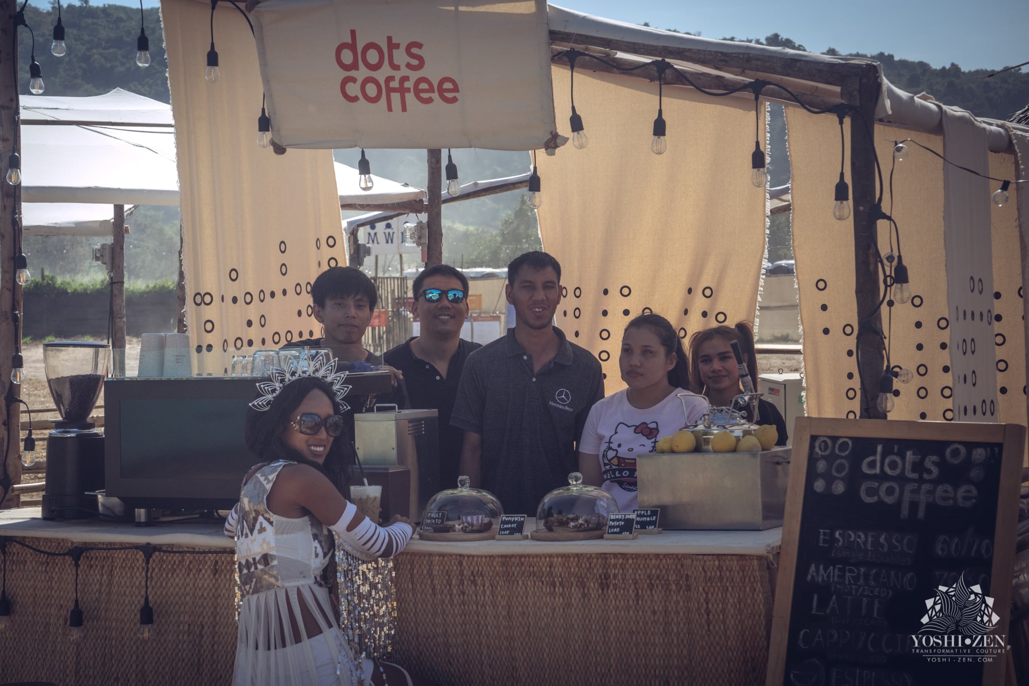 Festival-goers enjoying food in the communal dining area