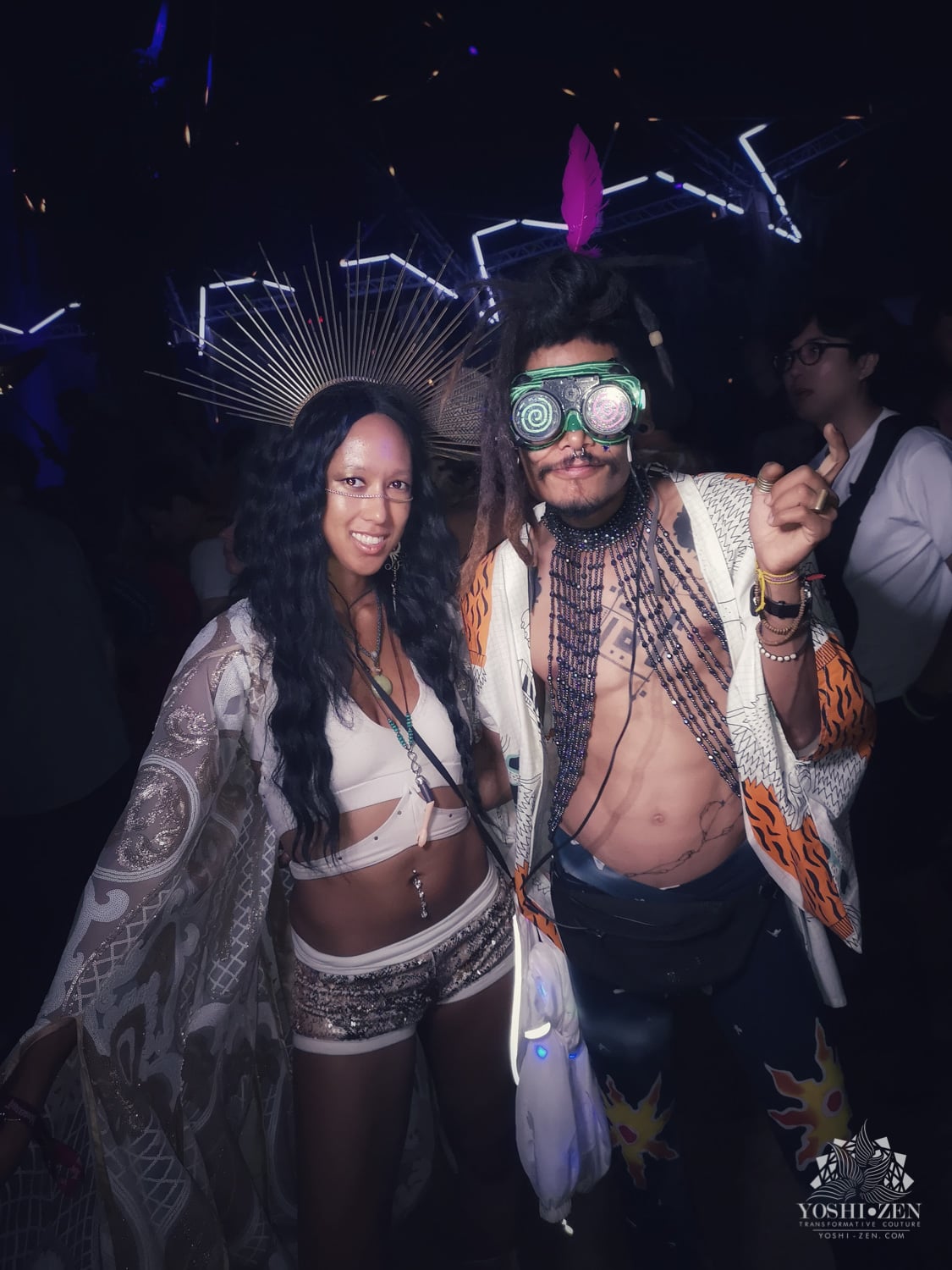 Group of friends dancing together at Wonderfruit