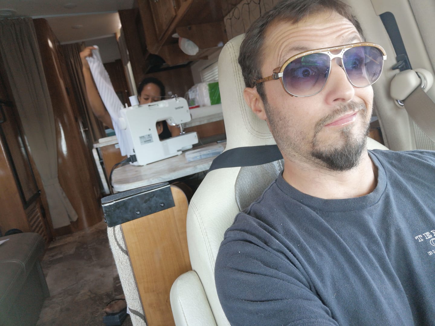 Sewing the wedding outfits in the RV on the way to Burning Man