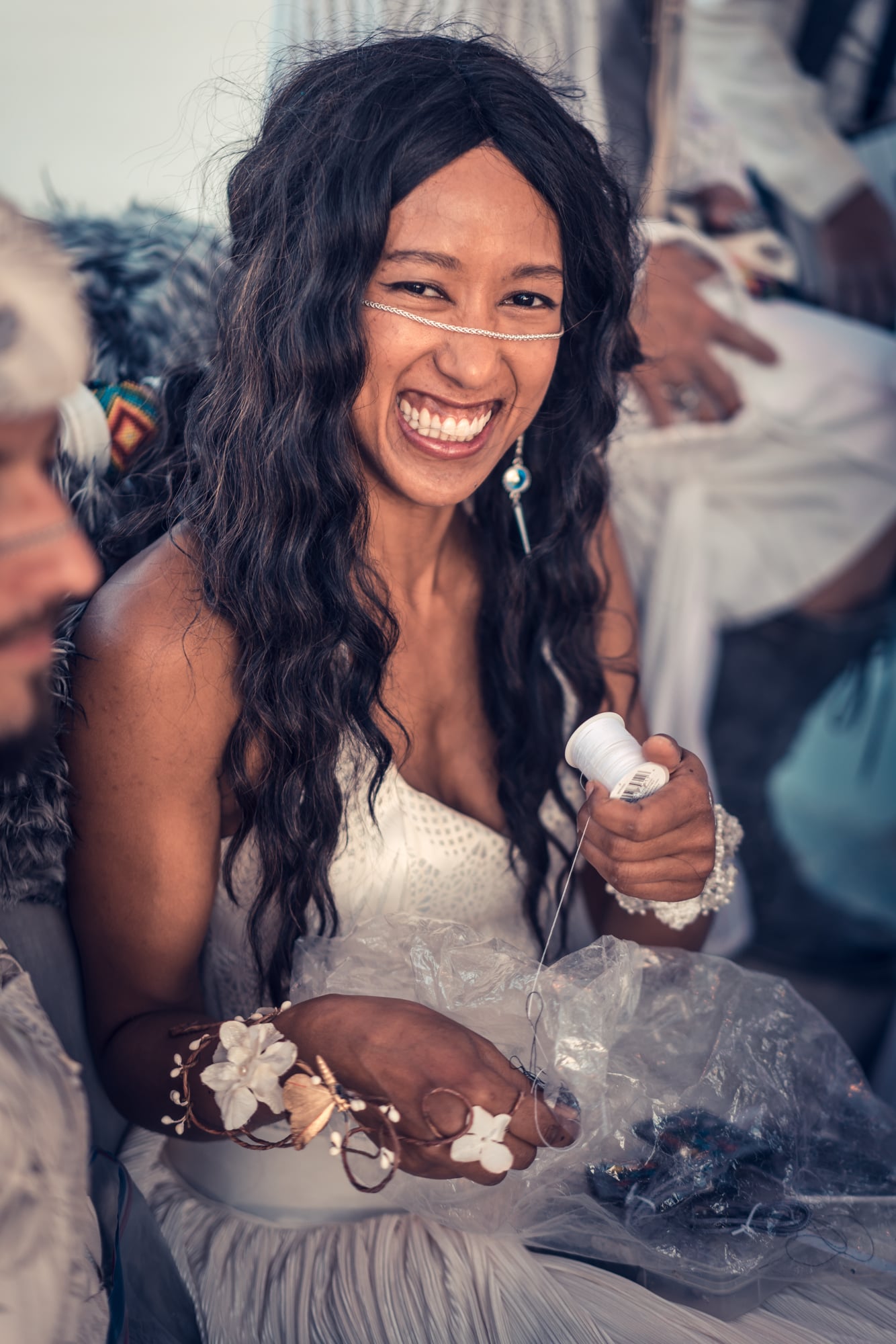 Last minute wedding dress sewing on the art car