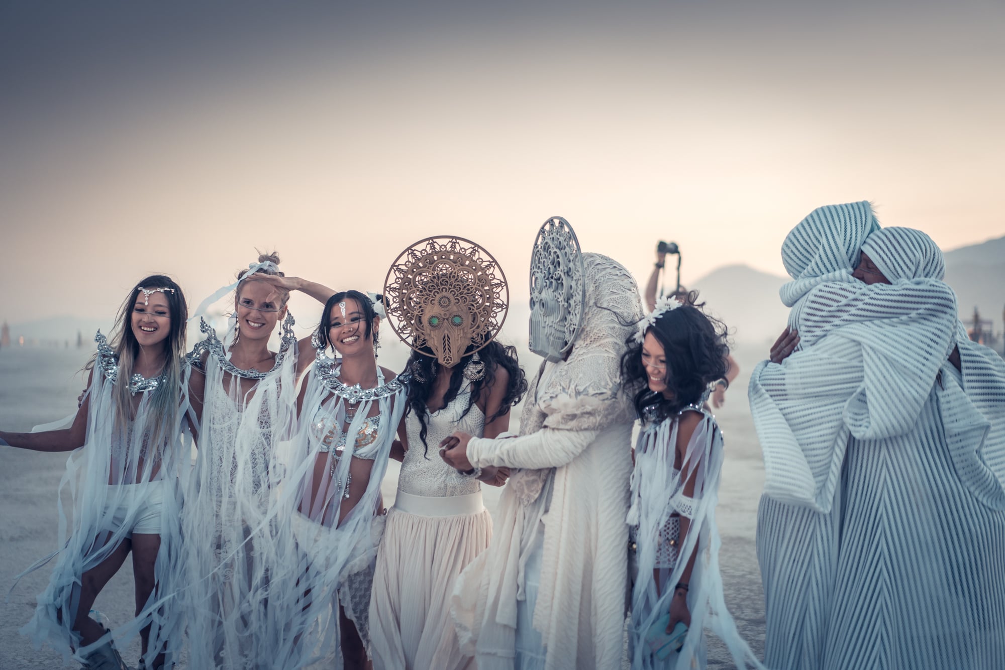 Gilles and Yoshi on the playa in wedding outfits