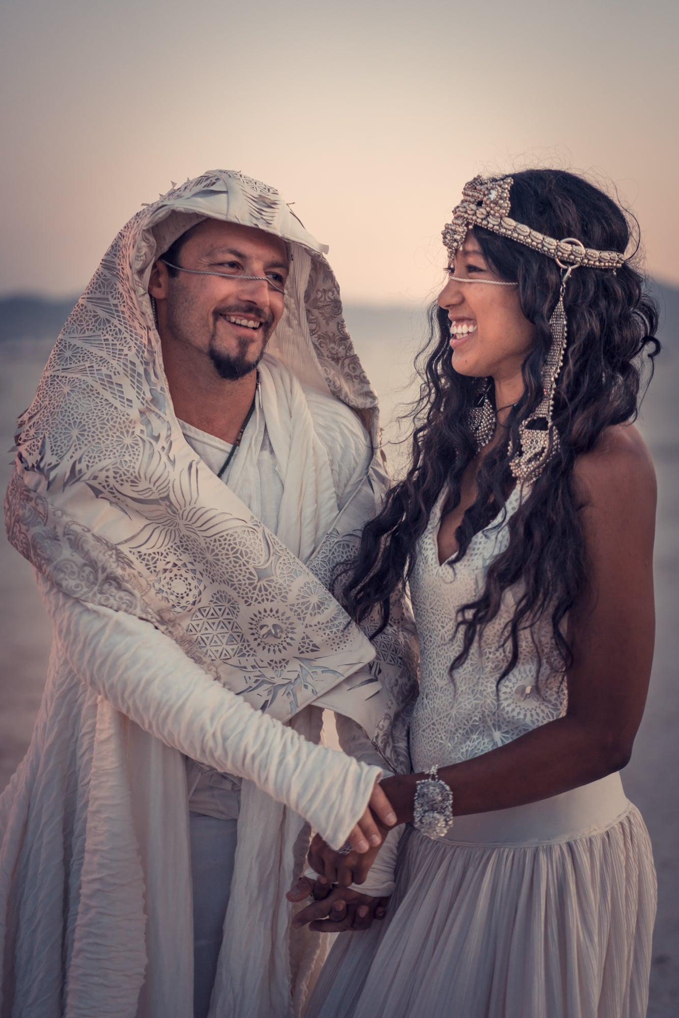 Wedding couple on the playa at Burning Man
