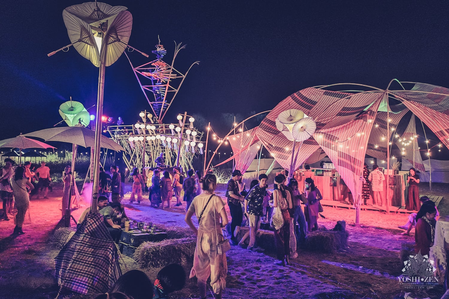 Attendees exploring the festival at night