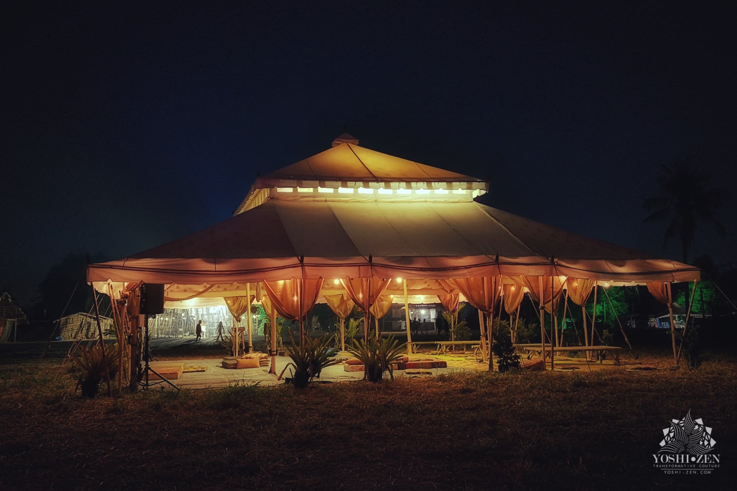 Crowds enjoying the nighttime atmosphere at Wonderfruit